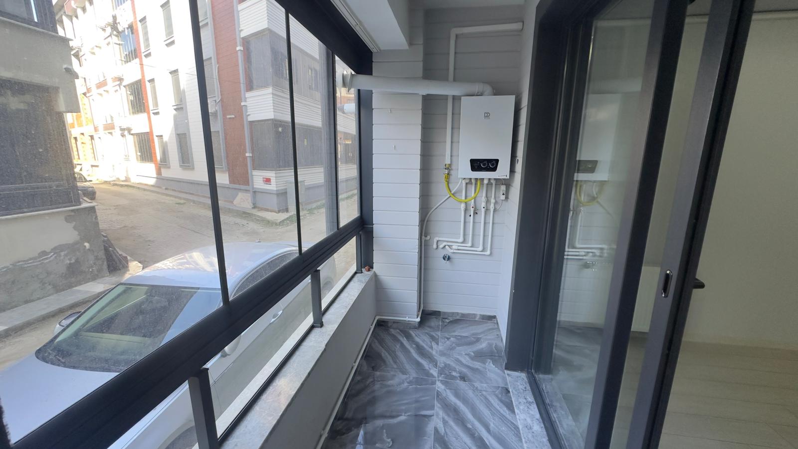 ÖMÜR'DEN AKÇAY MERKEZDE 2 YAŞINDA FIRSAT 1+1 SATILIK DAİRE görsel 5
